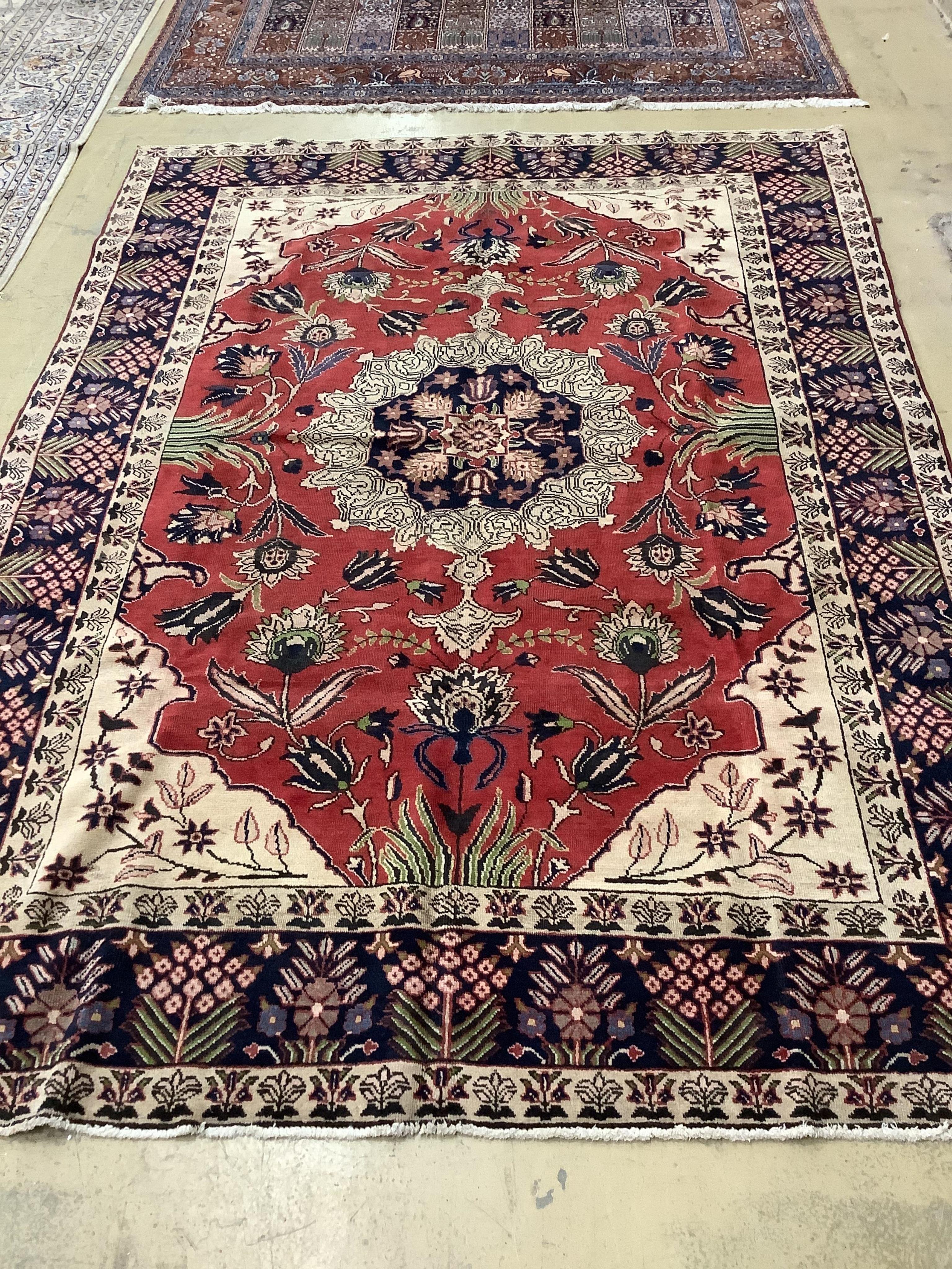 An Azarbaijan red ground carpet, 312 x 216cm. Condition - good